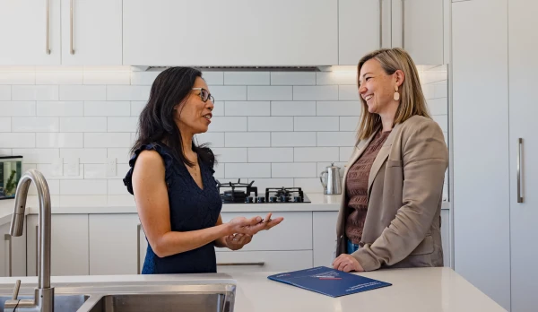 Property Owner having a discussion with a pukeko rental manager